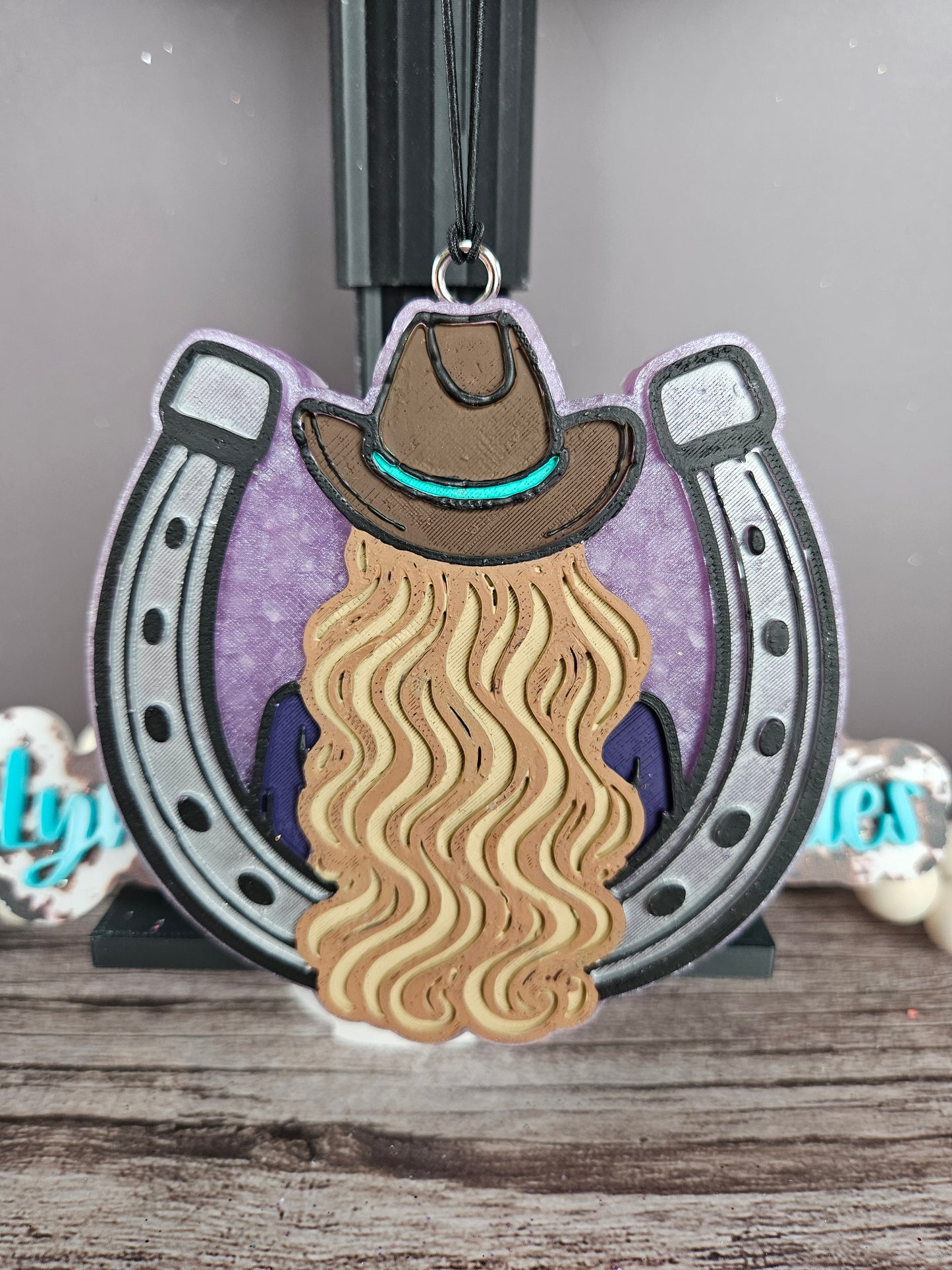 Cowgirl with Horse Shoe